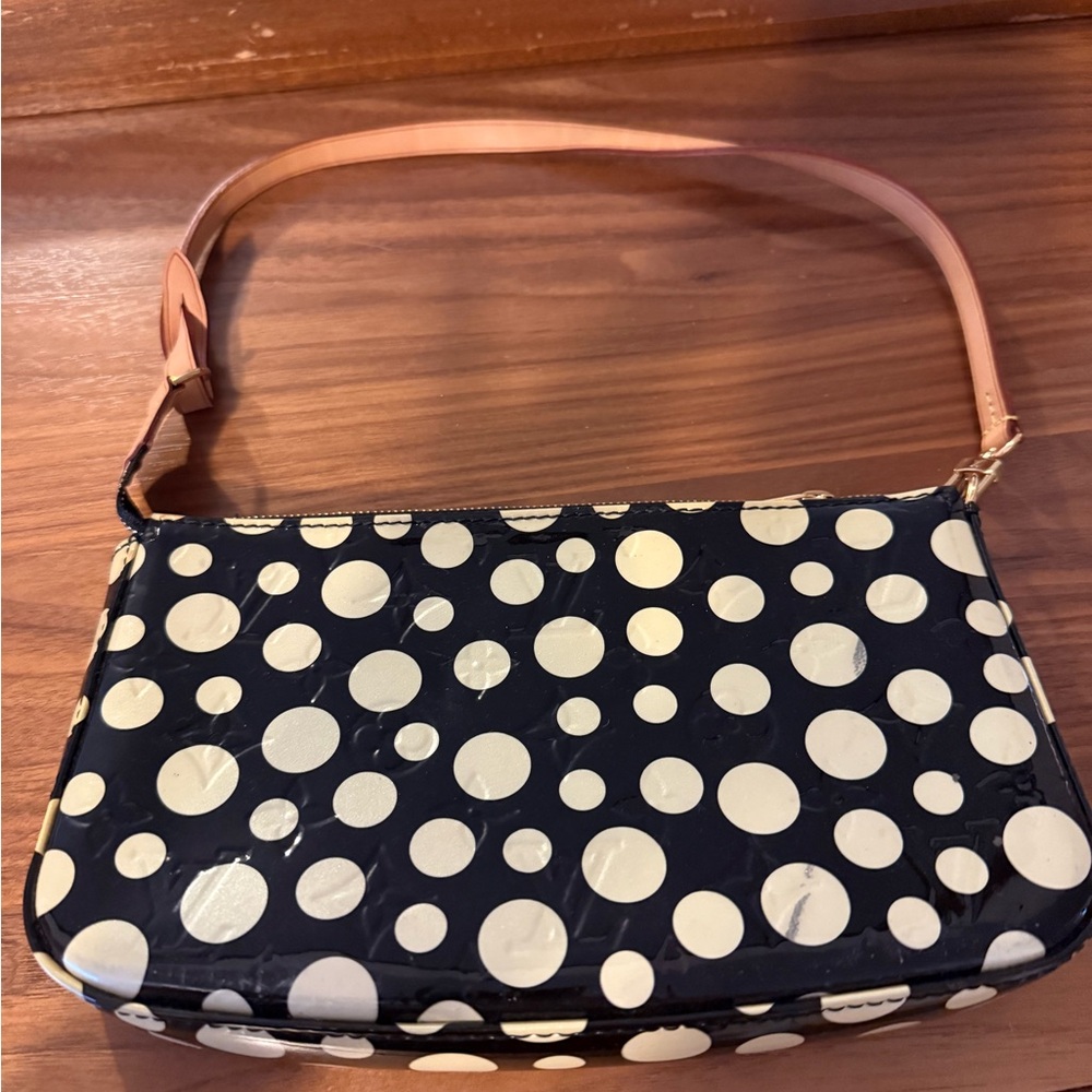 Louis Vuitton 2012 Yayoi Kusama Monogram with black and white dots pouchette.